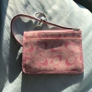 small pink Coach wristlet